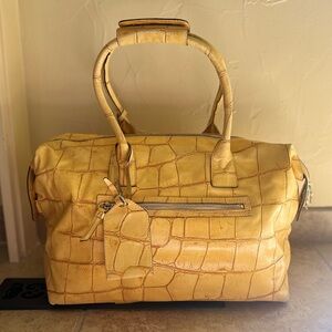 Dooney & Bourke yellow snake skin purse red interior